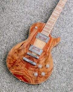 brown electric guitar