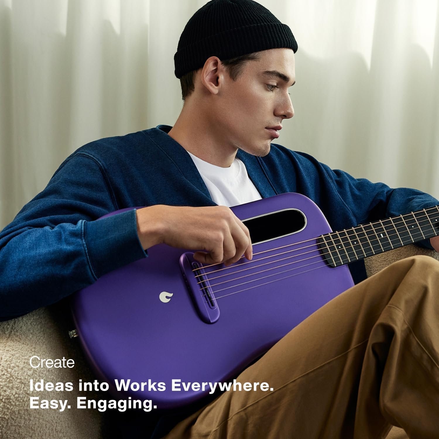 LAVA ME Play modern acoustic electric guitar in a minimalist living space