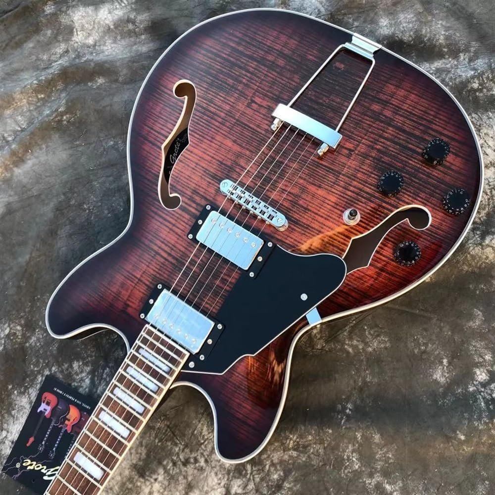 Left handed hollow body jazz guitar prepared for rehearsal practice